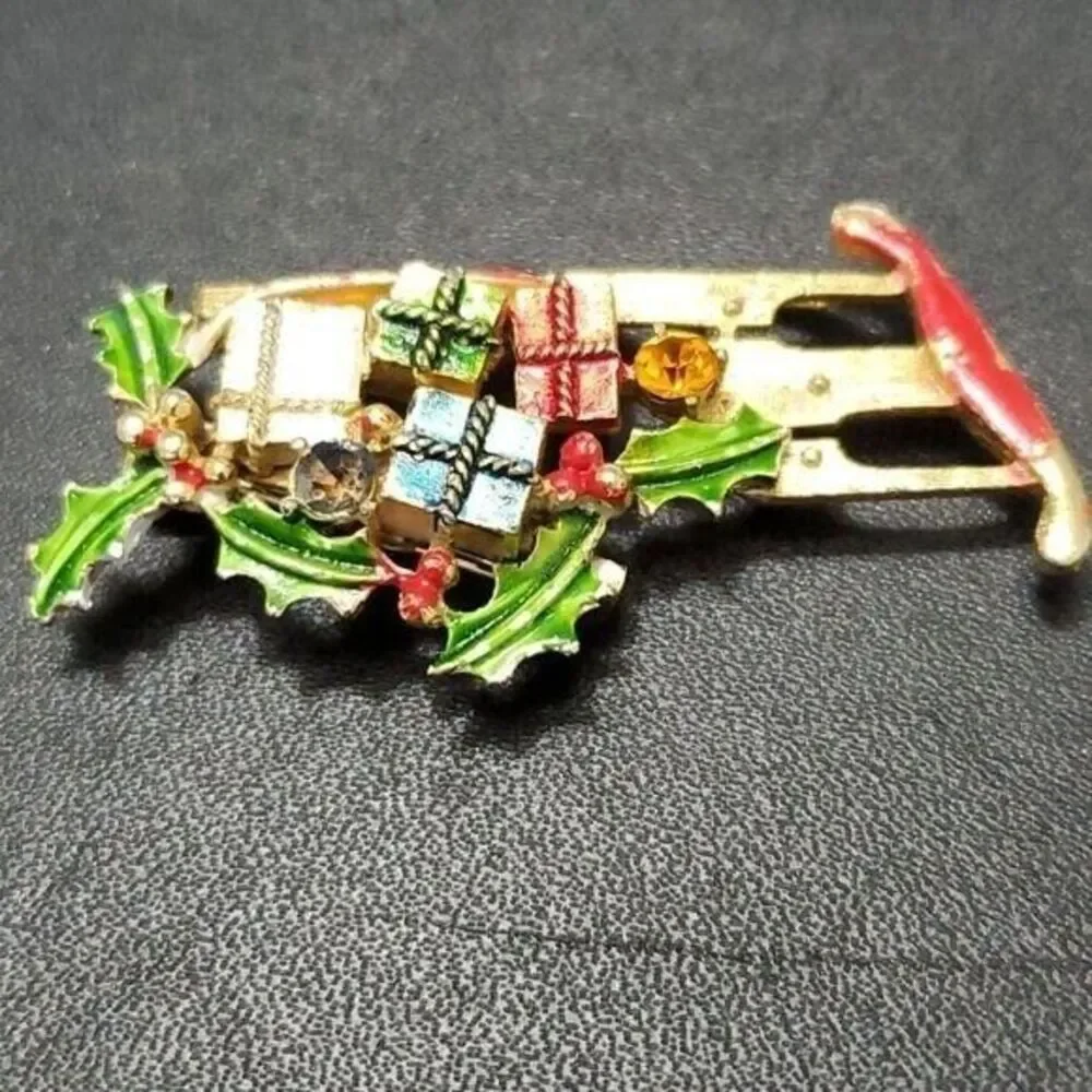 Vintage Weiss holiday sled brooch gold tone red green